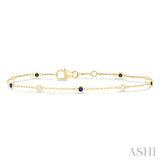 1.8 MM Sapphire and 1/10 Ctw Bezel Set Round Cut Diamond Precious Gemstone Station Bracelet in 14K Yellow Gold