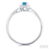 5x3 MM Octagonal Shape Blue Topaz and 1/20 Ctw Single Cut Diamond Halo Semi-Precious Ring in 14K White Gold