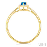 5x3 MM Pear Shape Blue Topaz and 1/20 Ctw Single Cut Diamond Halo Semi-Precious Ring in 14K Yellow Gold
