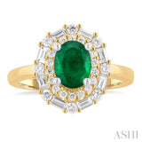 7x5 MM Oval Cut Emerald and 5/8 Ctw Baguette & Round Cut Diamond Halo Precious Ring in 14K Yellow and White Gold