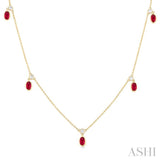 5x3 MM Oval Shape Ruby and 1/8 Ctw Round Cut Diamonds Precious Station Necklace in 10K Yellow Gold