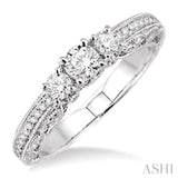1/2 Ctw Diamond Engagement Ring with 1/5 Ct Round Cut Center Stone in 14K White Gold